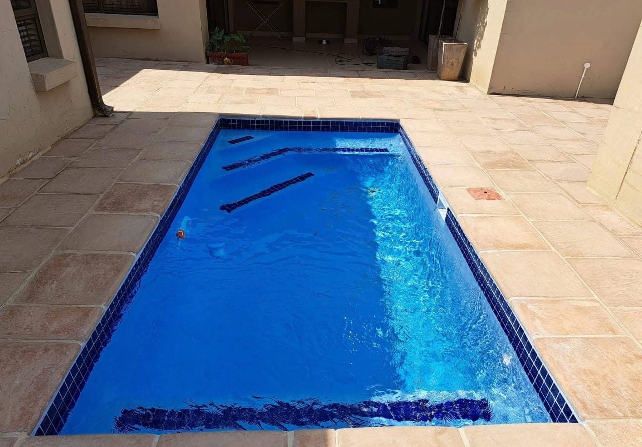 Pool with greek-key mosaic
