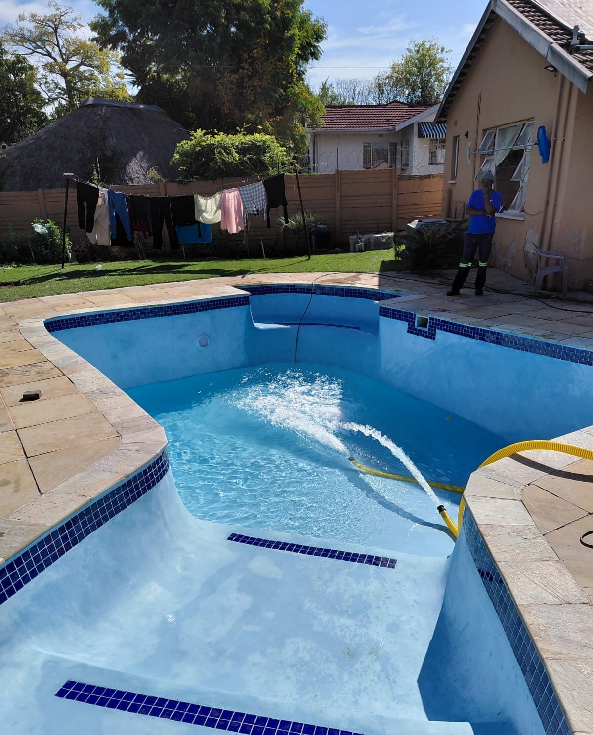 Freeform pool with paving