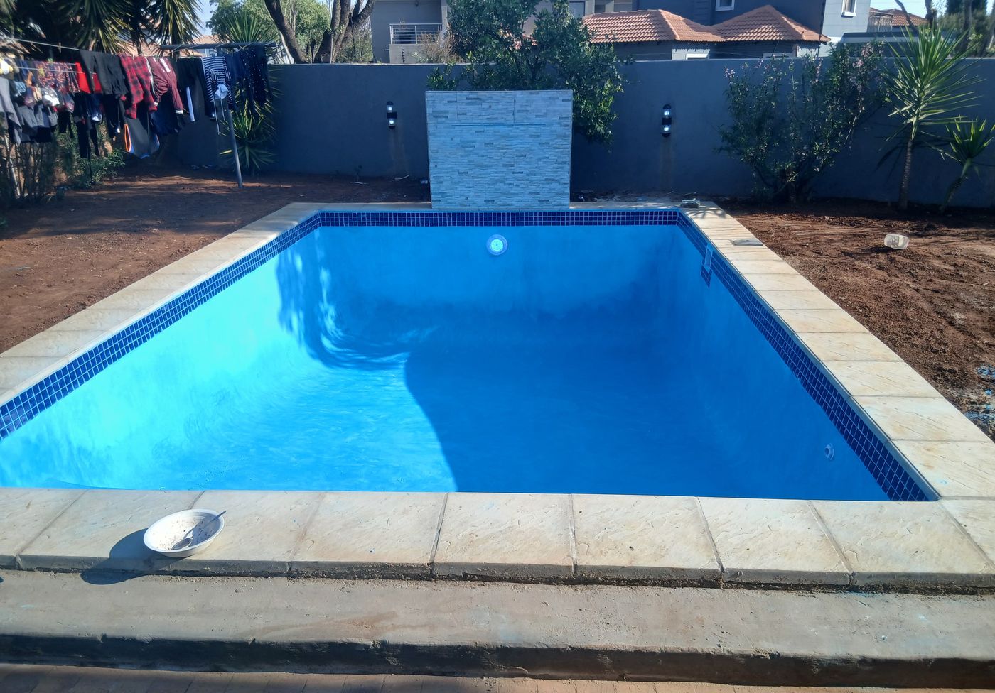 New rectangular pool finished in deep blue