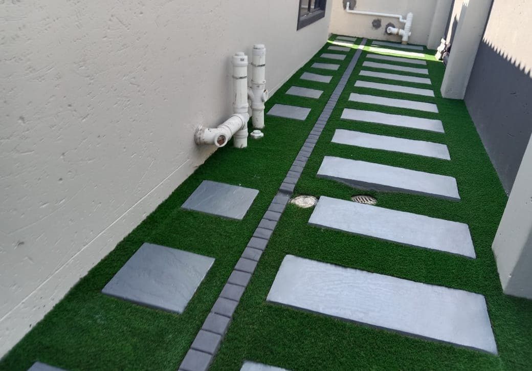 Artificial turf and stepping-stone path
