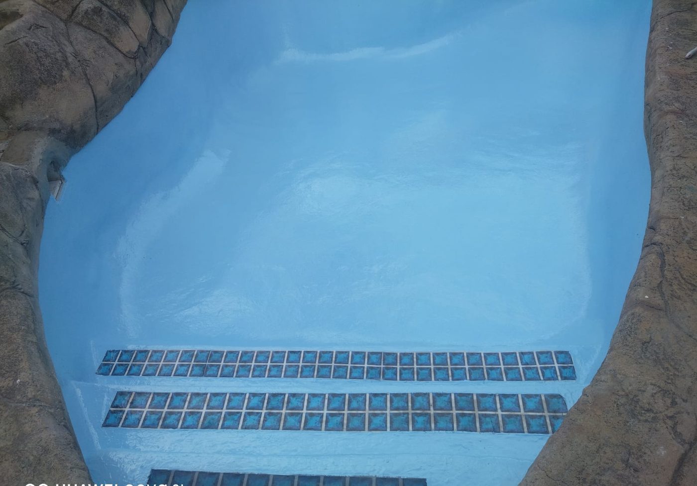 Freshly resurfaced blue pool
