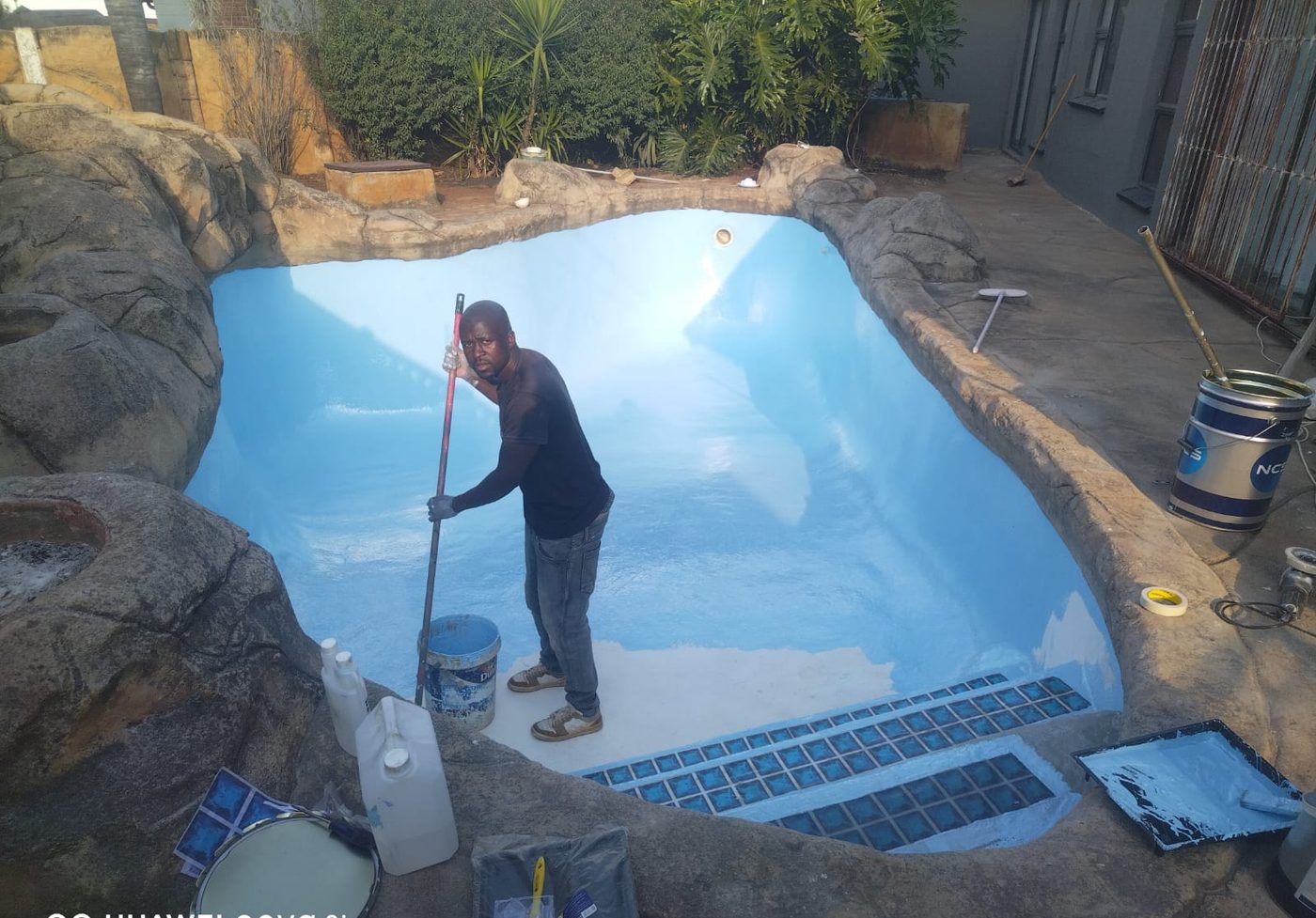 Freshly resurfaced blue pool