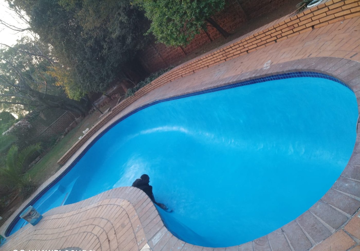 Same pool resurfaced and finished in clean blue by JD